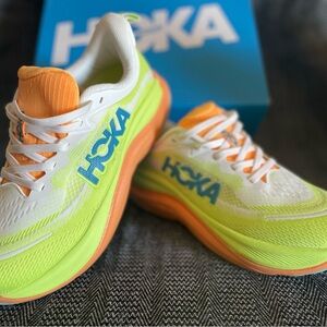 Hoka White and Lime Running Shoes with Orange Accents
